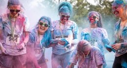 Students covered in paint after the color run