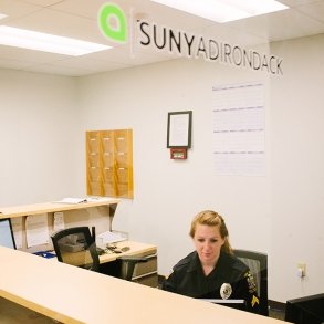 Campus security officer Megan is seen in the security office