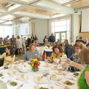 Community members at an event in the Northwest Bay Conference Center