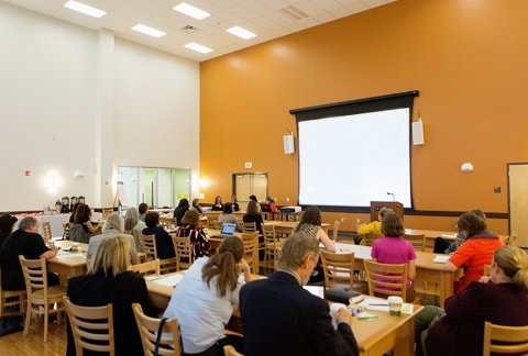 Women in Business talk in the multipurpose room in the residence hall